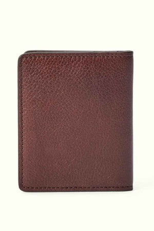 The RM Williams Farrier Fold Cardholder is shown closed against a light background. It features a premium leather design with a textured surface, visible stitching along the edges, and practical card slots for organization.