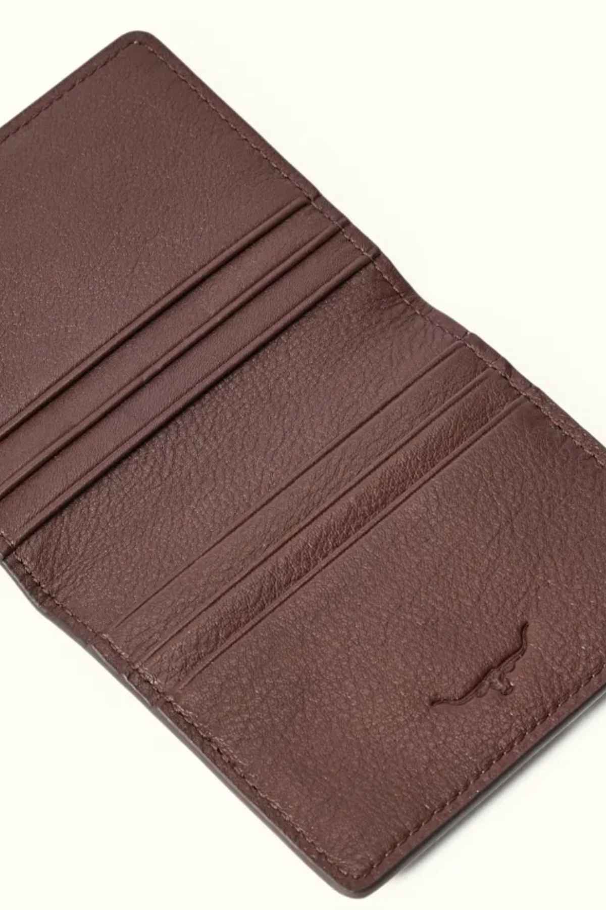 RM Williams Farrier Fold Cardholder, crafted from premium leather in brown, features multiple card slots inside on a light background. A small embossed logo adorns the bottom right.
