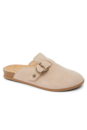The REEF Vista Serenity is a beige suede slip-on with a closed toe, cork insole, light brown rubber sole, and a gold buckleβideal for those seeking stylish and comfortable women's footwear.