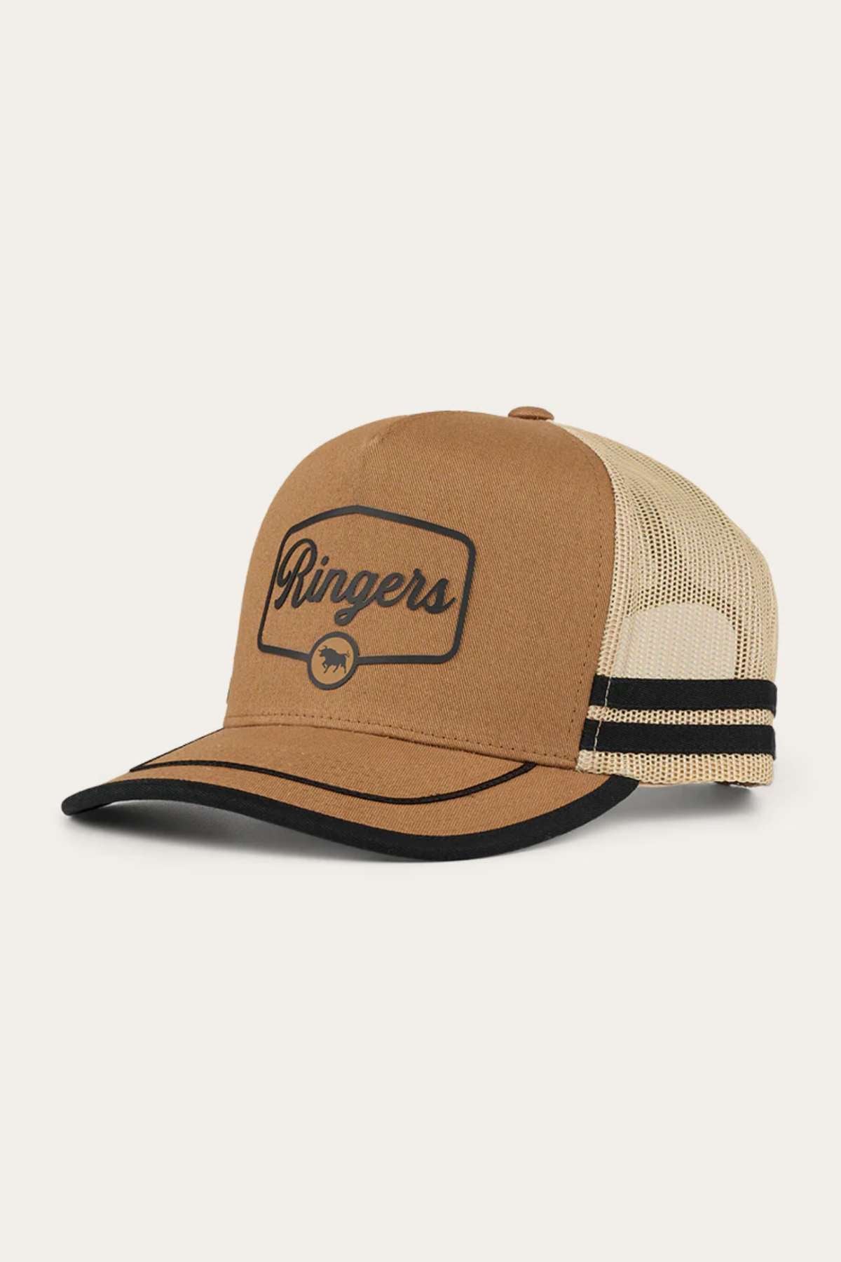 The Ringers Western Cobar Trucker Cap features a brown and beige design with a black bill and mesh back. It showcases the word "Ringers" in black text on the front panel, accompanied by a small circular logo beneath it, and includes an internal sweatband for all-day comfort.
