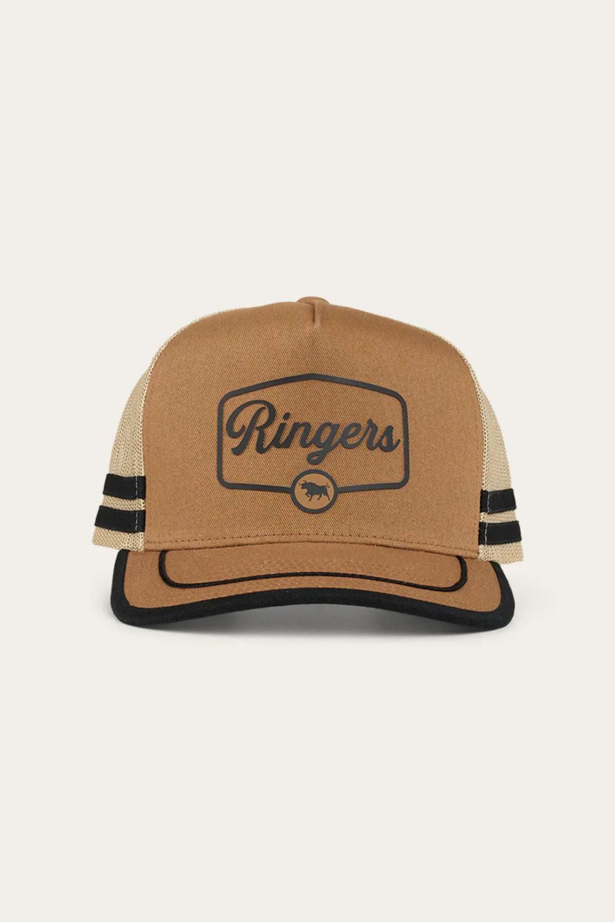 The Ringers Western Cobar Trucker Cap is a stylish brown and beige headgear with black accents. It prominently features the word "Ringers" on the front, accompanied by a small circular bull logo. The mesh back provides excellent breathability, while an internal sweatband ensures added comfort. Black stripes on either side add a fashionable element to the design.