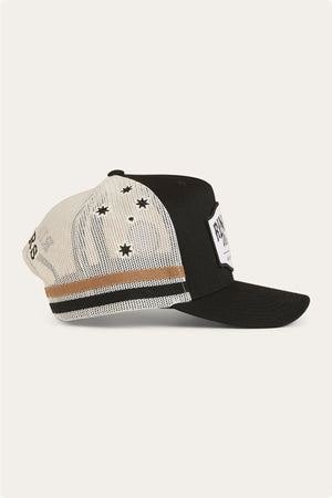The Ringers Western Country Club Deep Fit Trucker Cap features a black and white design, black bill, brown and black stripe above the adjustable strap, star mesh accents, and a rectangular front patch.