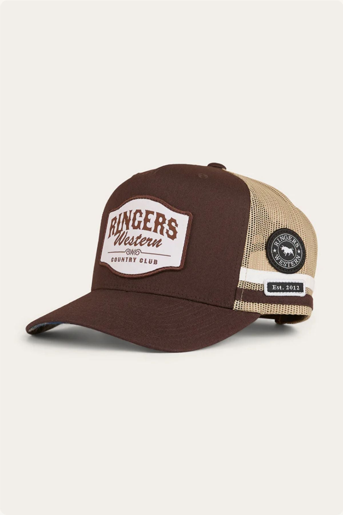 The Ringers Western Country Club Deep Fit Trucker Cap features a brown and beige mesh design, deep fit, curved brim, front "Ringers Western Country Club" patch, and a circular side patch reading "Est. 2012" for country style.