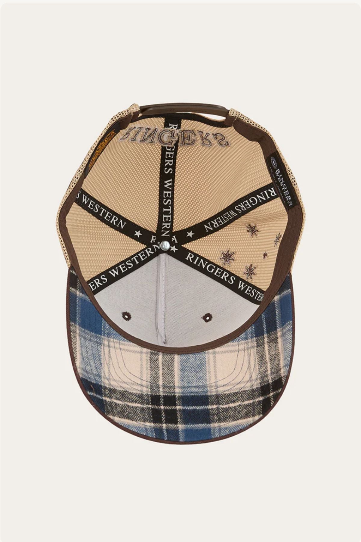 The Ringers Western Country Club Deep Fit Trucker Cap features a plaid country-style front, tan mesh back, brown brim underside, star-shaped stitching, and black inner seams labeled "Ringers Western.