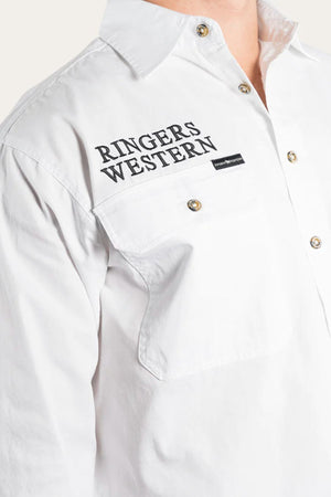 Wearing the Ringers Western Hawkeye Embroidered Shirt, a white premium cotton button-up featuring "RINGERS WESTERN" printed in black on the chest, metal buttons, a small black tag below, and a classic collar.