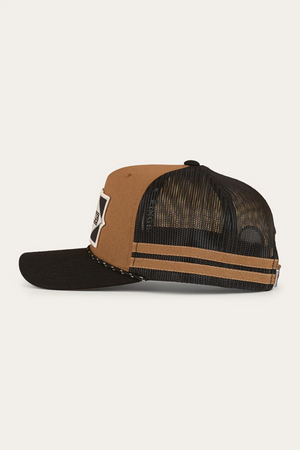 Side view of the Ringers Western Hometown Trucker Cap showing its deep fit, brown front panel, black mesh back with two brown stripes, black curved brim, adjustable snapback, and a partly visible front patch.