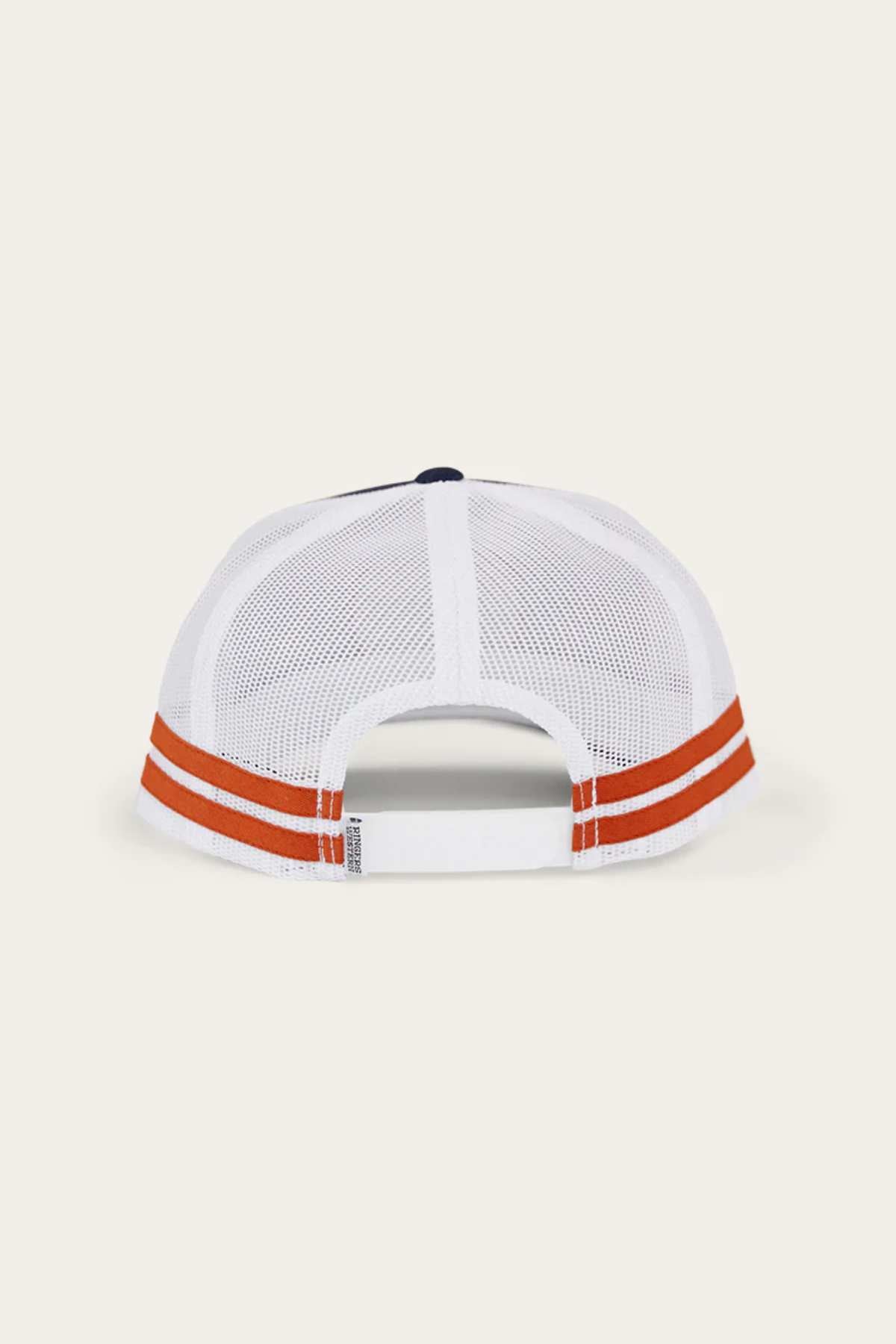 The Ringers Western McCoy Trucker Cap, featuring a breathable white mesh back with two horizontal orange stripes near the adjustable strap, combines comfort with its mesh fabric and cotton twill panel. The adjustable strap ensures a customizable fit.