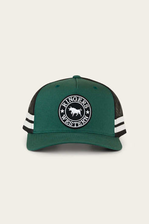 The Ringers Western McCoy Trucker Cap is a green and black trucker hat made from durable cotton twill, featuring white side stripes and a front circular patch with "Ringers Western" and a bull image.