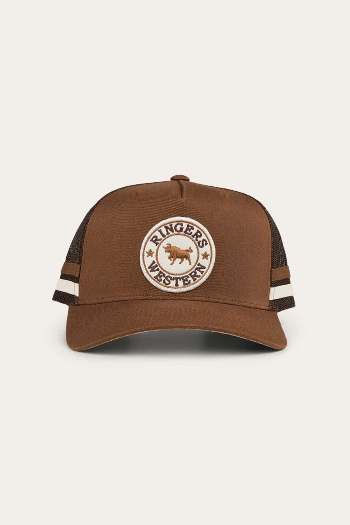 The Ringers Western Pendleton Trucker Cap is a brown hat with a mesh back, featuring a circular patch on the front. The patch displays the text "RINGERS WESTERN" encircling an image of a bull. The cap also includes white and brown striped detailing on the sides and an adjustable snapback for a perfect fit.