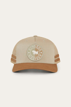 The Ringers Western Signature Bull Flag Trucker Cap is a tan and brown trucker cap featuring a circular logo with a horse and "Ringers Western" text. The cap has two brown stripes on each side and an adjustable snapback closure in the back. The background is light and plain.