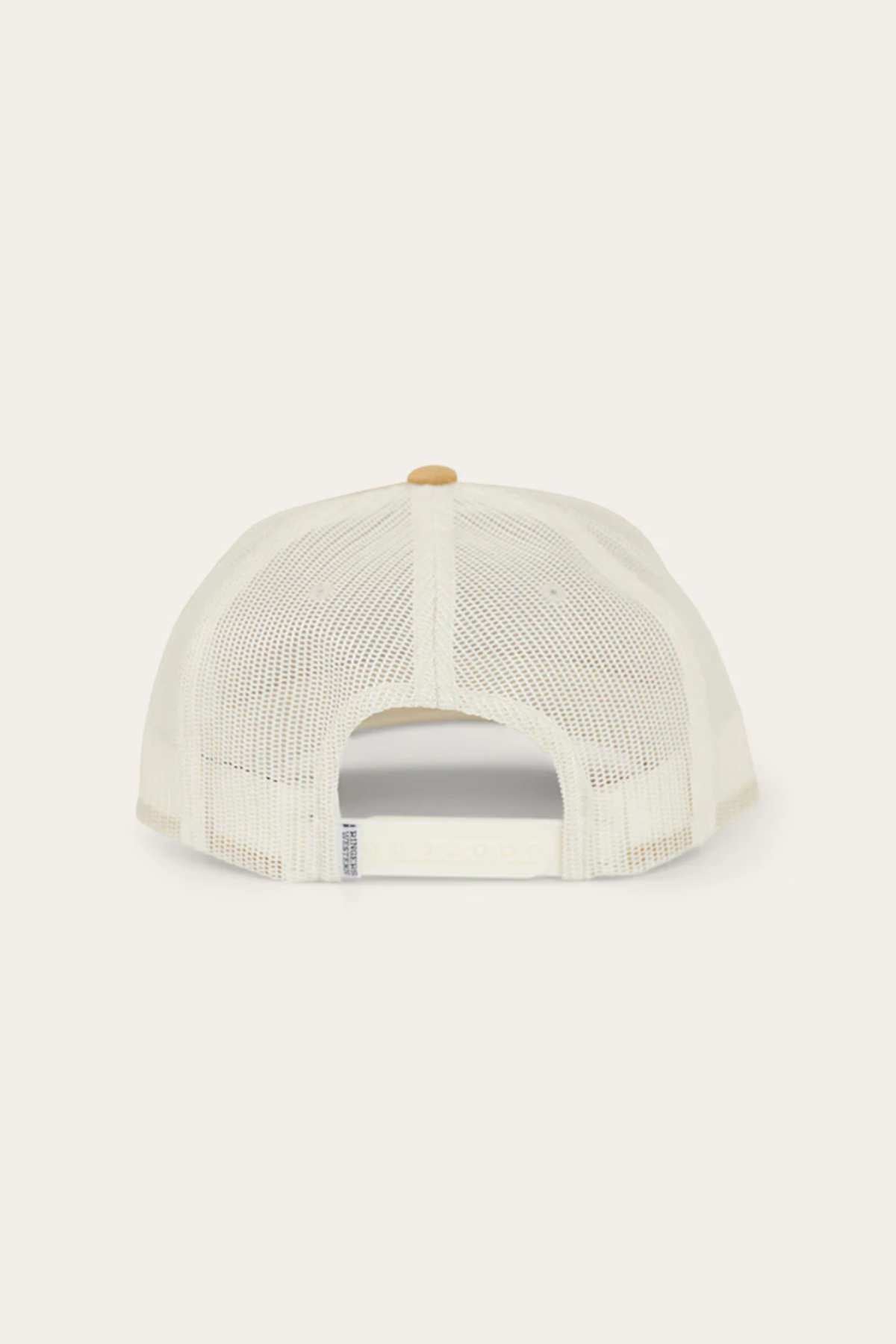 The Ringers Western Wheatbelt Wool Trucker Cap in beige is displayed from the back, highlighting its mesh design, adjustable strap, and a small top button.