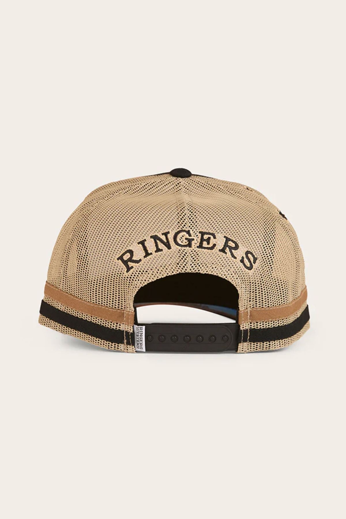 The Ringers Western Workhorse Trucker Cap is shown from the back in beige mesh, with "RINGERS" in black above the adjustable snapback—an ideal cap for everyday use.