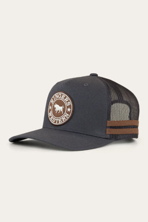 The Ringers Western McCoy Trucker Cap is black with a brown circular "Ringers Western" patch and bull logo, mesh back, snap-back closure, and two brown side stripes.