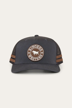 The Ringers Western McCoy Trucker Cap is a dark grey snap-back with a mesh back, brown side stripes, and a front circular patch that says "RINGER'S WESTERN" around a bull image.