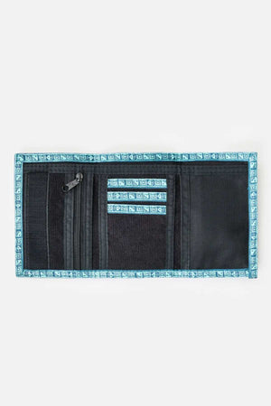 The Rip Curl Archive Cord Surf Wallet, a black rectangular wallet with blue, patterned trim, is open to reveal several compartments. It includes multiple card slots, a mesh pocket, and a zippered section for organizing personal items and cards. The surf wallet is displayed against a plain white background.