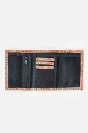 A rectangular fabric Rip Curl Archive Cord Surf Wallet, featuring a tribal-patterned border, is open to display multiple compartments. These include a zippered pocket, several card slots detailed with similar tribal patterns, and a larger cash pocket against a white background.