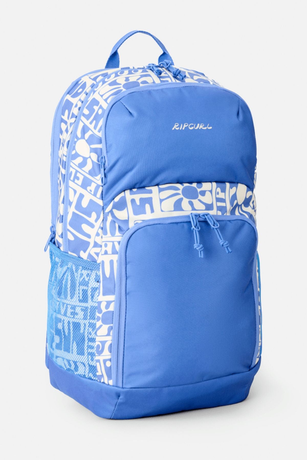 The Rip Curl Chaser 33L Backpack in blue features a white abstract pattern, is made from recycled polyester, and includes a front zip pocket, side mesh pocket, and top handle. It stands upright against a light background.