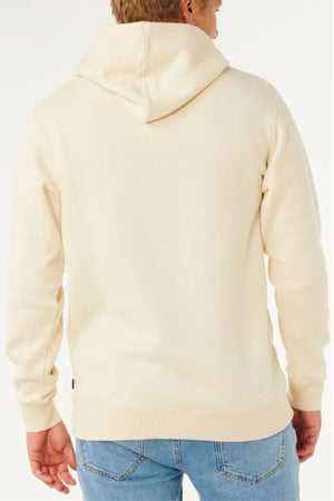 A person is shown from the back against a plain white background, wearing the Rip Curl Classic Surf Hood in cream and light blue jeans.