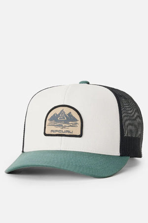 The Rip Curl Custom Curve Trucker has a cream cotton twill front, green visor, black mesh back, and a mountain graphic “RIP CURL” patch for the perfect finishing touch.