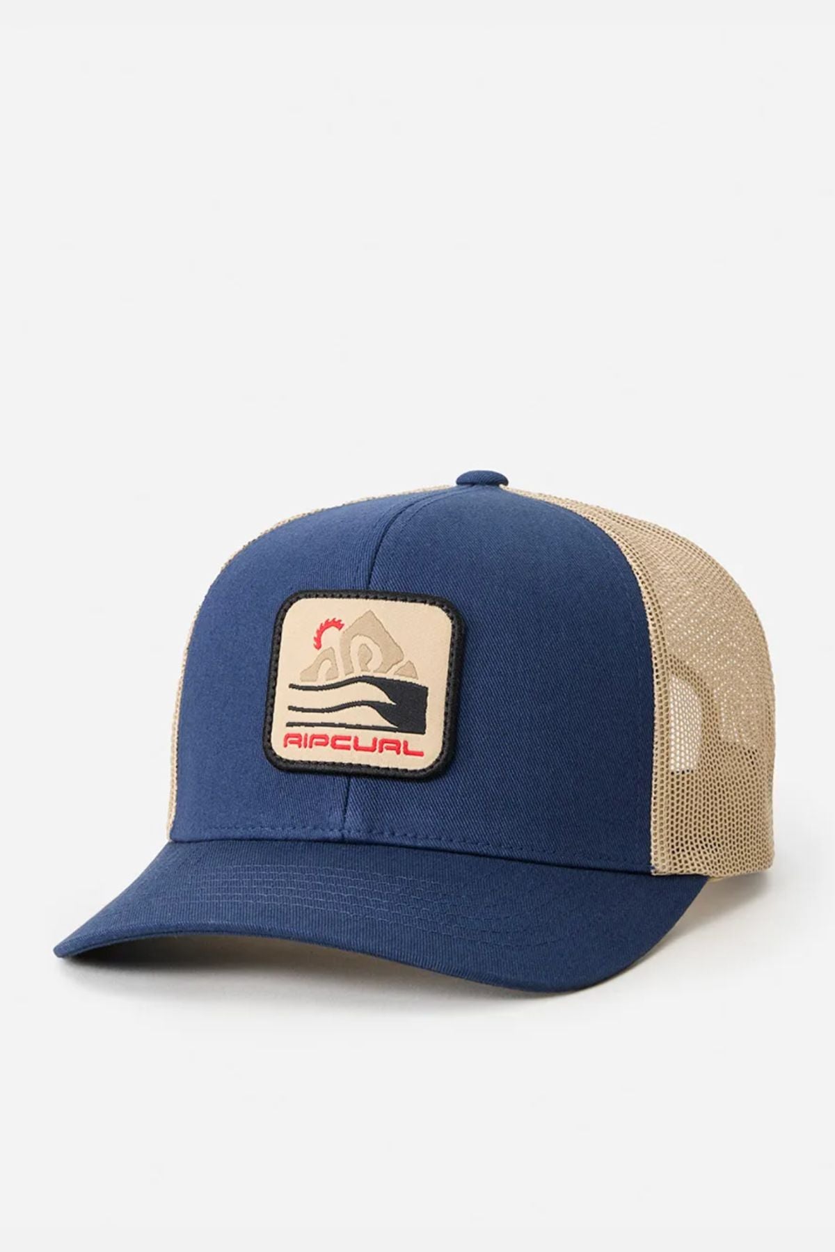 The Rip Curl Custom Curve Trucker hat features a blue and beige design, curved peak, mesh back, and a front patch with a wave, sun, and "RIPCURL" in red. Made from cotton twill, it's shown against a plain white background.
