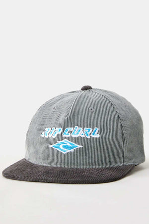 The Rip Curl Diamond Adj Cap features gray 11 wale cord fabric, a dark gray brim, and an embroidered white and light blue βRIP CURLβ logo with wave design on the front.