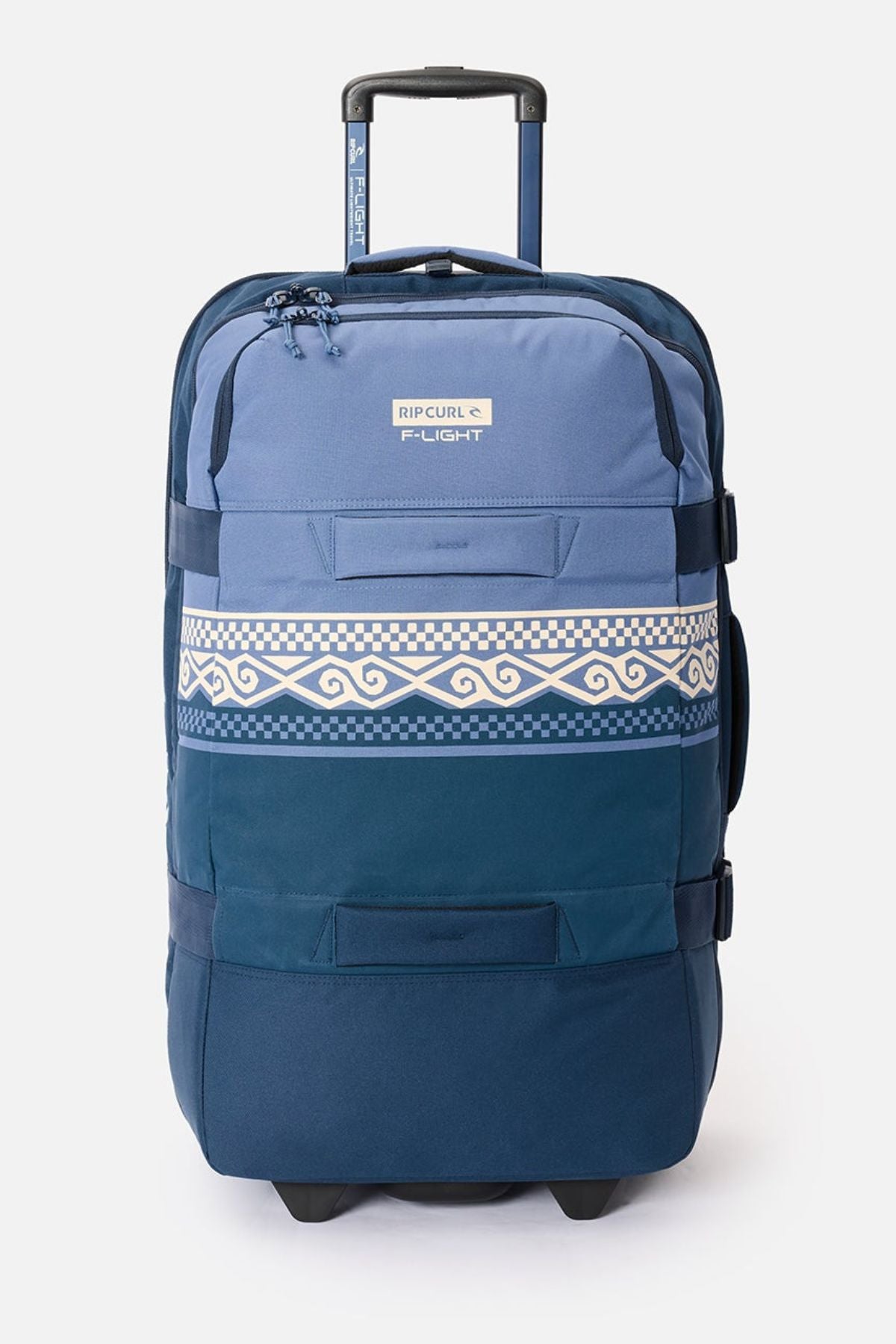 The Rip Curl F-Light Global 100L Cosmic Kiss Wheeled Travel Bag is blue with a patterned white stripe featuring wave designs, a telescopic handle, wheels, and multiple exterior zip compartments.