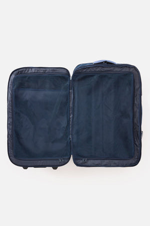 The Rip Curl F-Light Global 100L Cosmic Kiss Wheeled Travel Bag is shown open and empty on a white background, laid flat to display its navy blue AirTag-compatible interior compartments and mesh divider panels.