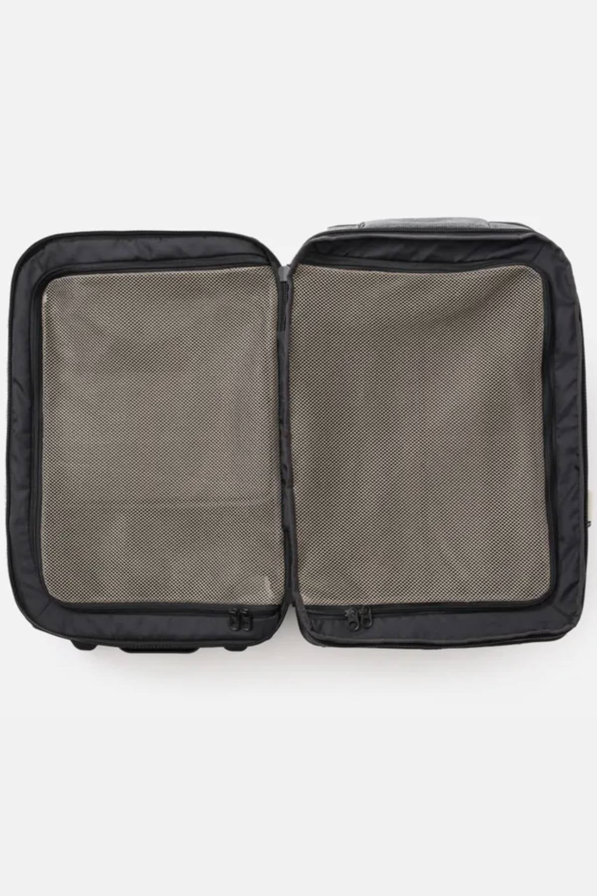 An open black Rip Curl F-Light 45L Classic Surf Transit Bag is shown on a plain background. It offers two large main compartments lined with light gray fabric, including mesh zippered covers for organization. This eco-friendly design utilizes recycled polyester for sustainable travel.