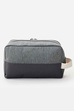 The Rip Curl Groom Classic Surf Toiletry Bag is an eco-friendly option, showcasing a sleek design with a gray fabric top and a darker gray base. It comes equipped with a zipper closure and a beige loop handle, making it ideal for minimalist travelers.