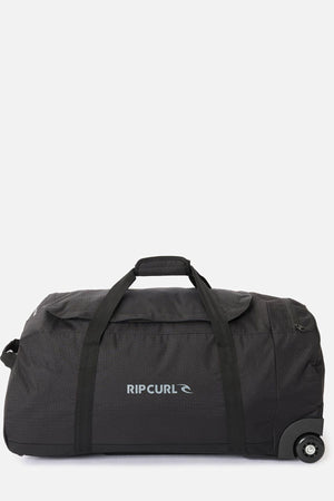 A large black Rip Curl Jupiter 80L travel bag with two handles, side strap, and inline skate wheels is displayed on a plain light background.