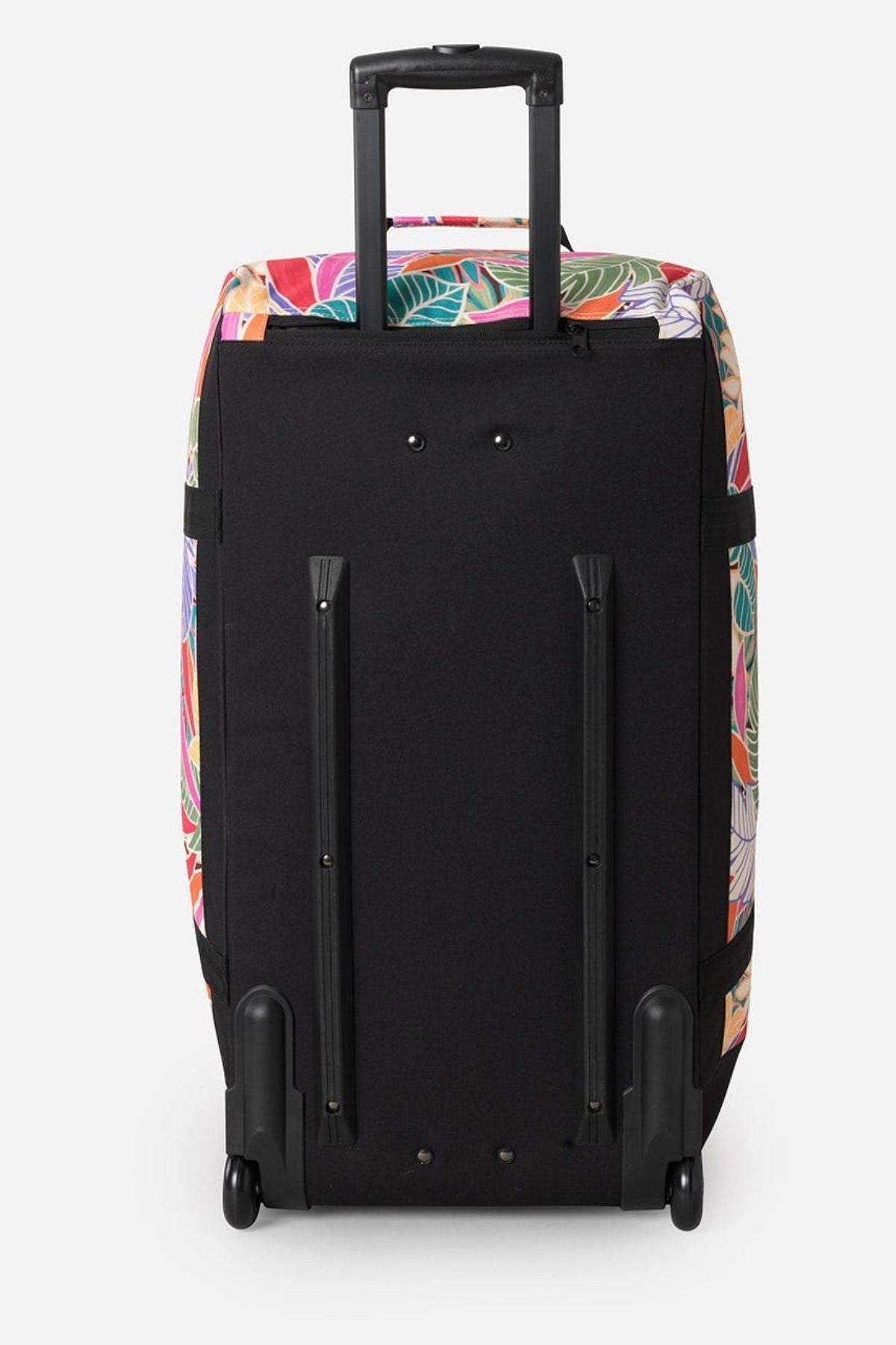 The Rip Curl Jupiter 80L Mixed Travel Bag, made of recycled polyester, stands upright with its black wheeled design and vibrant floral pattern on the sides and top. It features an extended telescopic handle and rests smoothly on two small wheels against a plain white background.