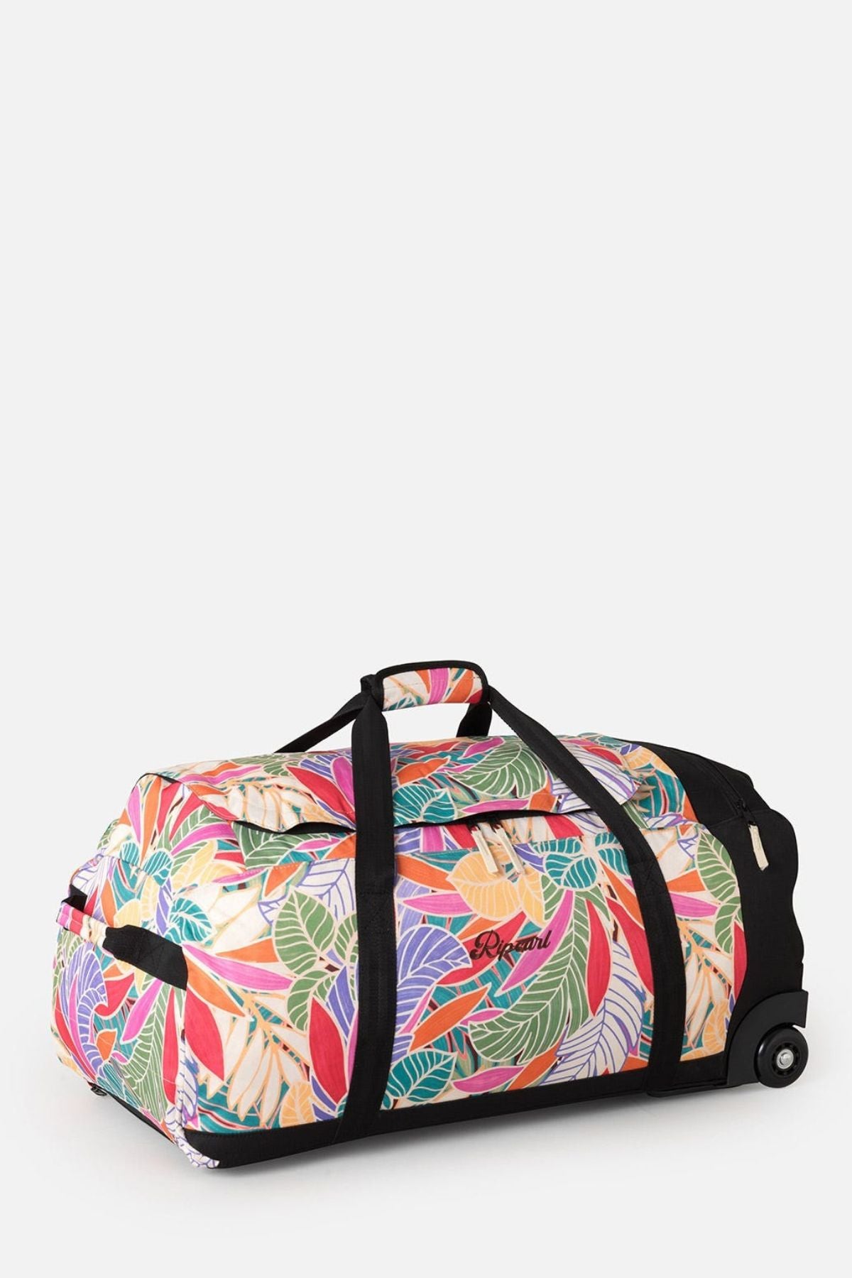 The Rip Curl Jupiter 80L Mixed Travel Bag is a large rolling duffel with a vibrant multicolor leaf pattern on recycled polyester. It includes black straps, smooth wheels, and a telescopic handle, with its colorful design standing out against a plain white background.