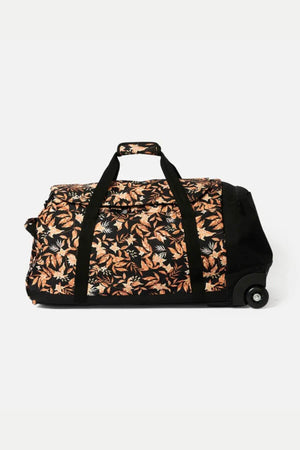 Meet the Rip Curl Jupiter 80L Travel Bag: a stylish black duffle with an orange and brown leaf pattern, made from recycled polyester. It boasts sturdy black straps, a top handle, and wheels for easy transport.