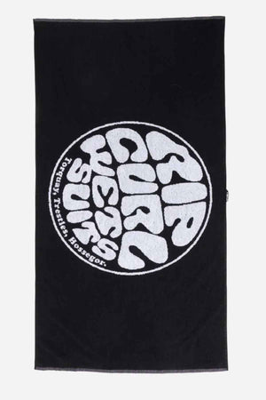 Presenting the Rip Curl Logos Towel in black, ideal for beach outings. This towel features a circular pattern with elegantly wavy white text: "Rip Curl, Surf, Torquay, Trestles, Hossegor." Crafted from high-quality cotton for ultimate softness and luxury.
