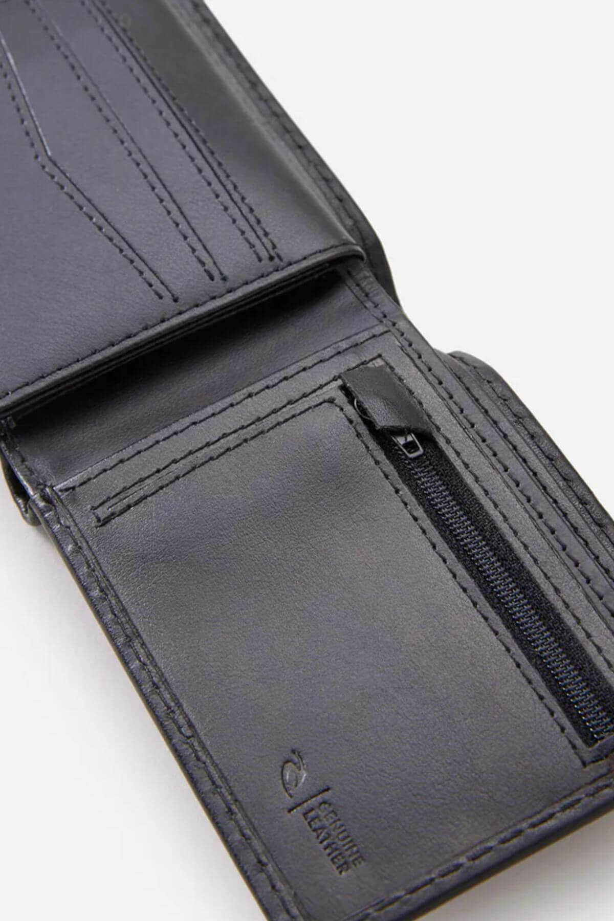 The Rip Curl Marked RFID All Day Wallet, made from black sheep nappa leather, offers multiple card slots, a zippered coin pocket, and detailed stitching. Inside, "100% genuine leather" is embossed in the bottom right corner.