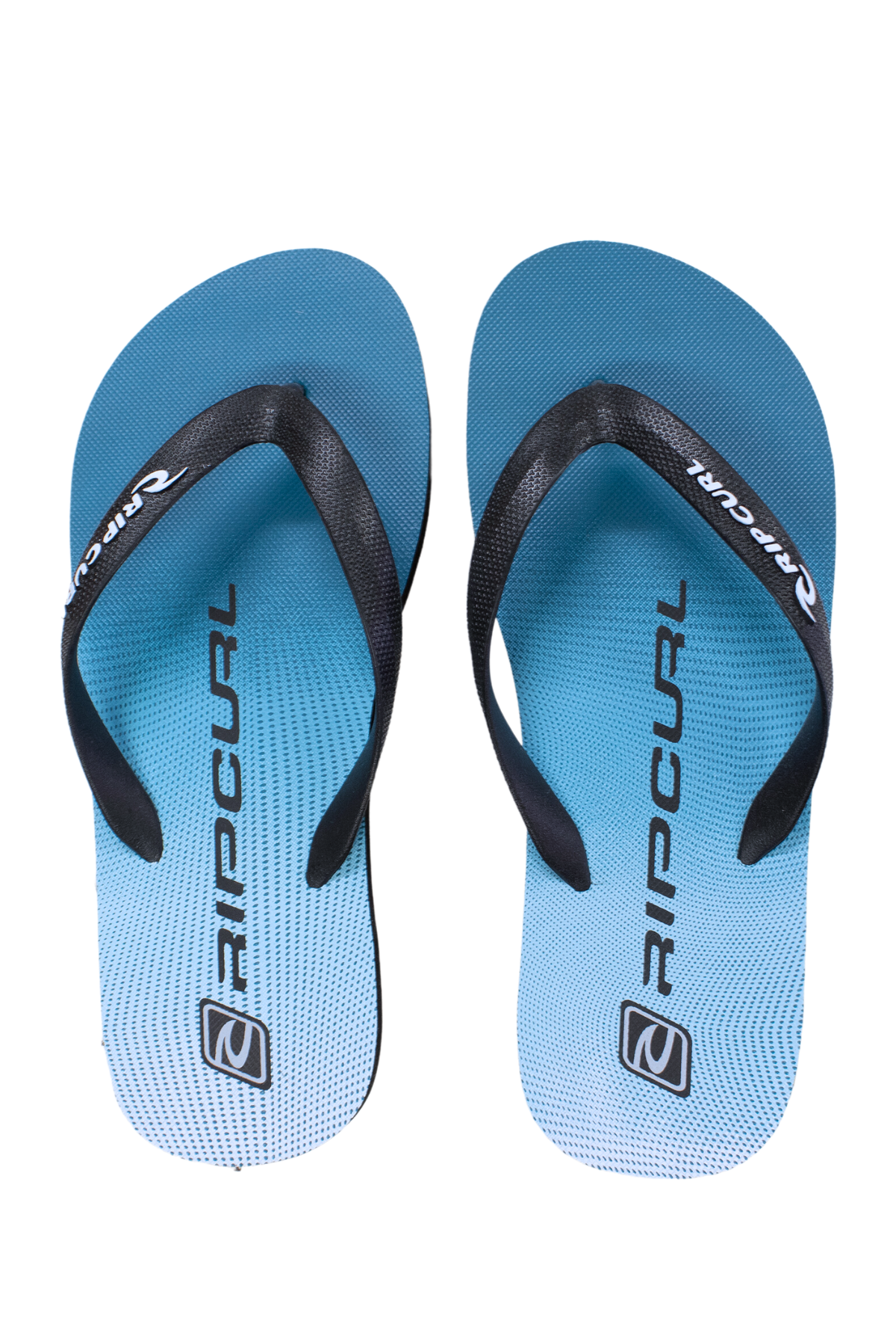 A pair of blue Rip Curl Max Shock Bloom Thongs with black straps, viewed from above. The Rip Curl logo is visible on the footbeds, combining style with cushioning support for all-day comfort.