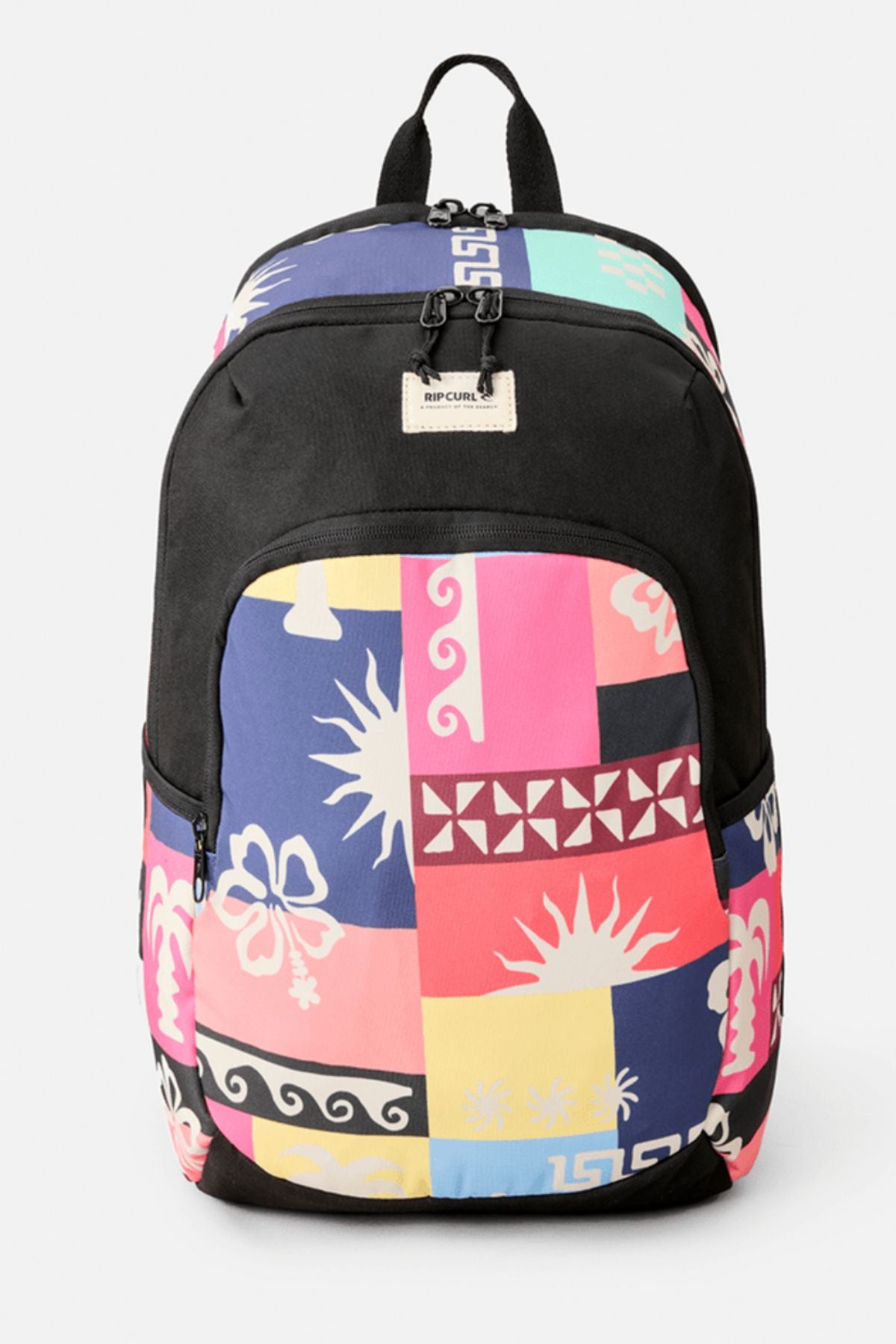 The Rip Curl Ozone 2.0 30L Backpack features a black top and handle, with bright pink, blue, yellow, and turquoise block patchwork accented by Hawaiian-style floral and sun patterns on the lower section.