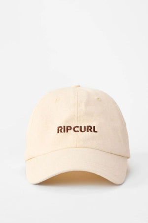 The Rip Curl Premium Surf Cap is a beige cotton twill hat with "RIP CURL" embroidered in brown on the front. This adjustable surf cap is shown against a plain white background.