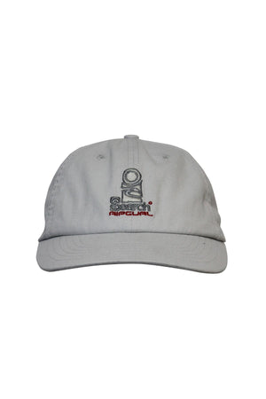 The Rip Curl Searchers SB Cap is a light gray cotton twill hat with a curved brim, featuring an embroidered abstract design and "Search Apparel" in black and red on the front, displayed against a white background.