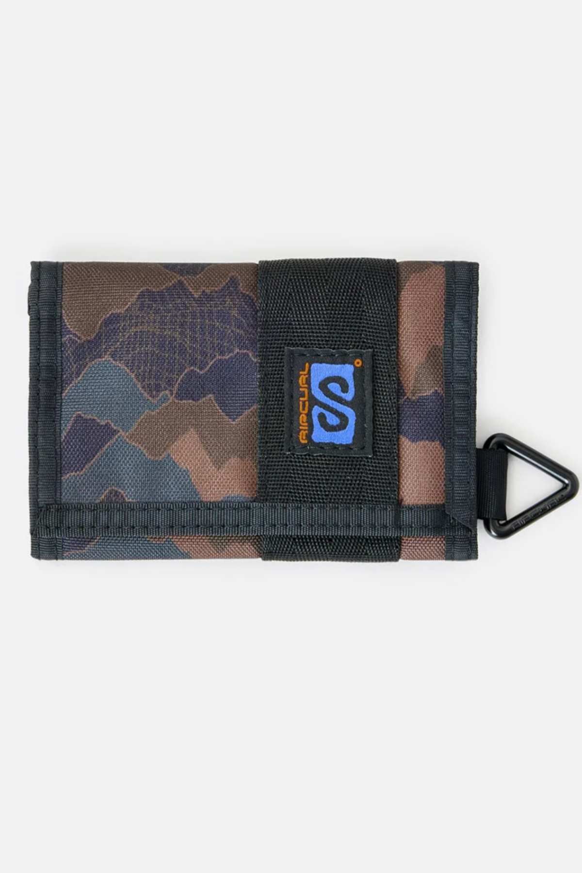The Rip Curl Search Surf Wallet is a tri-fold fabric wallet with blue and brown camouflage, black trim, Velcro closure, triangle clip, and logo patch—perfect for beach-goers seeking style and convenience.