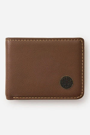 A brown Rip Curl Wetsuit Logo RFID All Day Wallet with visible stitching and a small round metal emblem in the lower right corner, displayed on a plain white background.