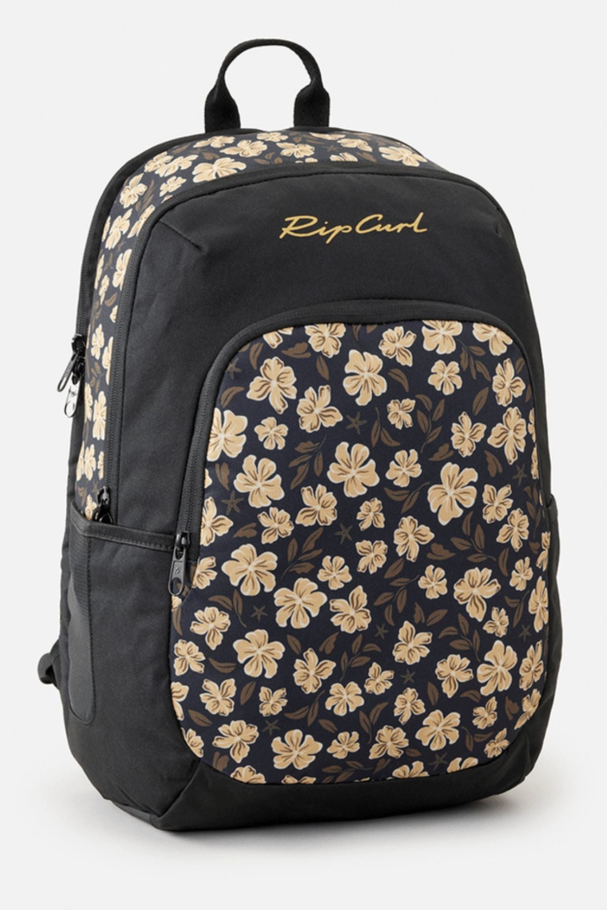 The Rip Curl Ozone 2.0 30L Backpack showcases a black design adorned with understated floral patterns in beige and brown on the front pocket. The "Rip Curl" logo is elegantly inscribed at the top. Made from recycled fabric, this backpack includes a top handle and utility side pockets for extra convenience.