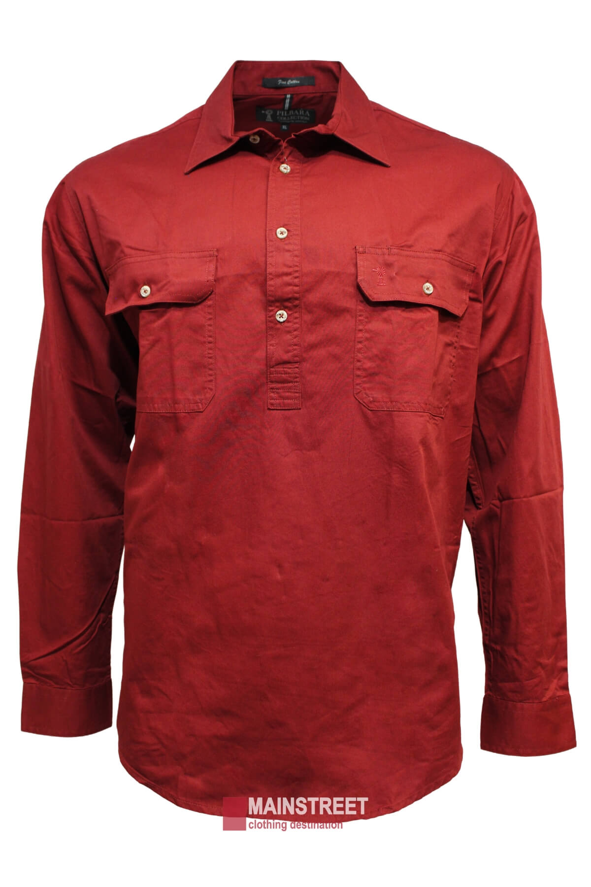 A long-sleeve, button-down red shirt displayed on a white background. The Ritemate Pilbara Long Sleeve Closed Front Shirt, made from 100% cotton, features two chest pockets with button closures and a collar. With a UPF rating of 50+, it ensures maximum sun protection. The brand name "Mainstreet" is visible at the bottom middle of the image.