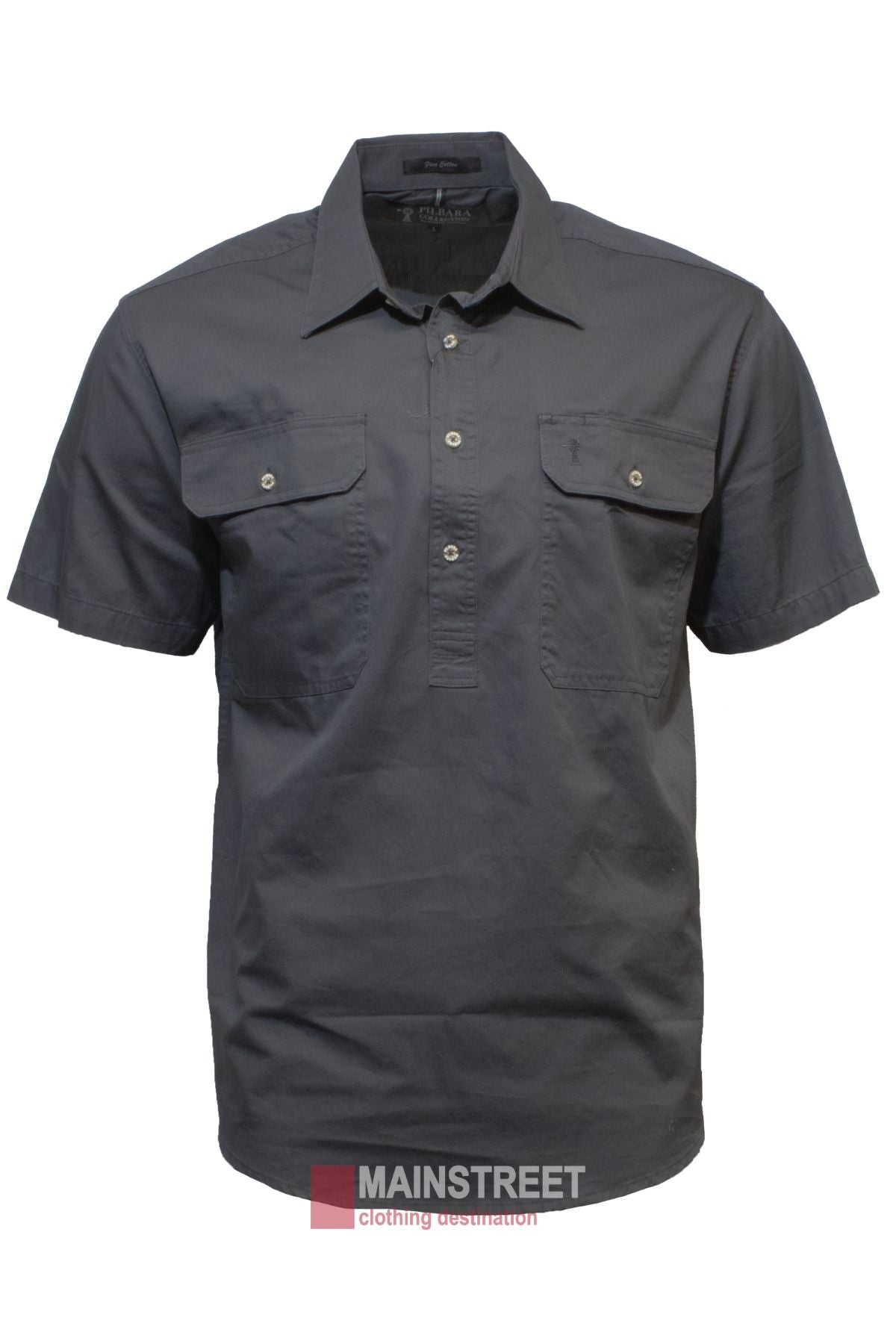 The "Pilbara Short Sleeve Closed Front," a dark gray men's work shirt with short sleeves, features two chest pockets and is set against a white background. Made from 100% cotton, it has a three-button placket and collar. It bears the brand name "MAINSTREET" and offers UPF 50+ sun protection.