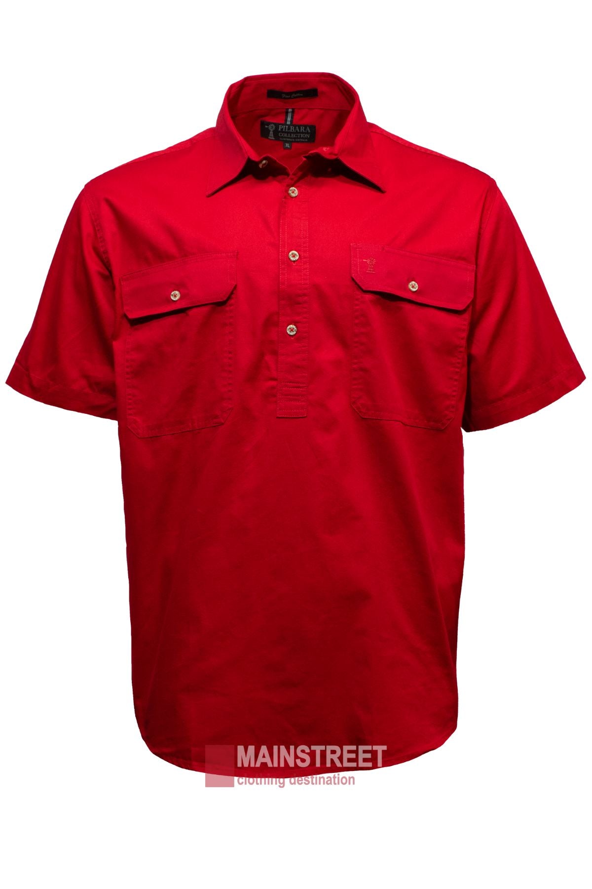 The Pilbara Short Sleeve Closed Front men's work shirt in bright red features two chest pockets, a collar, and the "MAINSTREET" logo near the bottom center. Displayed on a plain white background, it offers an impressive UPF 50+ rating.