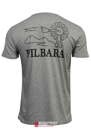 The Pilbara T-Shirt is a gray, breathable cotton tee with a bold back print of a windmill, mountains, clouds, and "PILBARA" in large black letters. Features the Mainstreet Clothing logo near the hem.