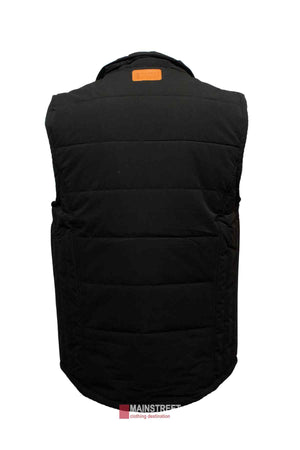 A back view of the black Pilbara Vest is shown. The waterproof vest features a quilted design with horizontal stitching and a small brown leather patch near the collar. Polyfill padding ensures warmth. The background is white, featuring a subtle "MAINSTREE" logo and tagline at the bottom center.
