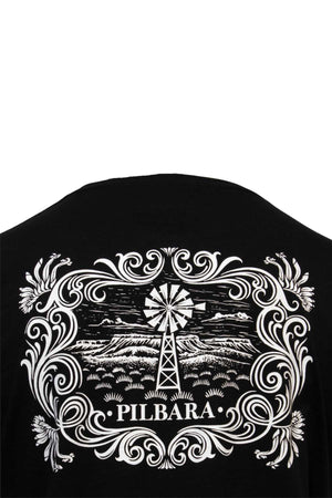 The Ritemate Pilbara Western Men's Short Sleeve T-Shirt is made from combed cotton jersey and boasts a detailed white graphic on the back. The design features a windmill at the center of a scenic landscape with hills and clouds, encircled by ornate patterns, and the text "PILBARA" at the bottom.