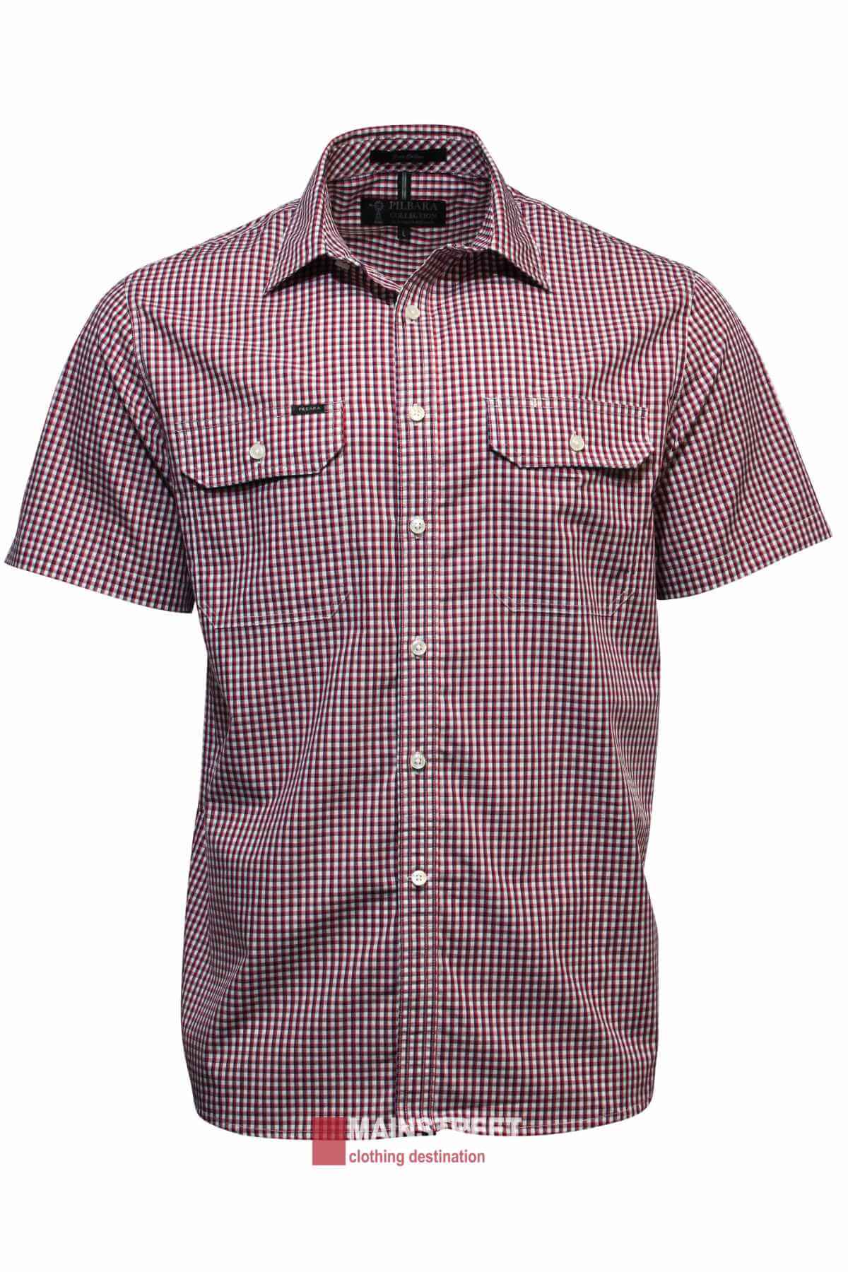 The Pilbara Short Sleeve Check Double Pocket Shirt features a red, white, and navy checked cotton design with two chest pockets and button-up front, shown on a plain white background.