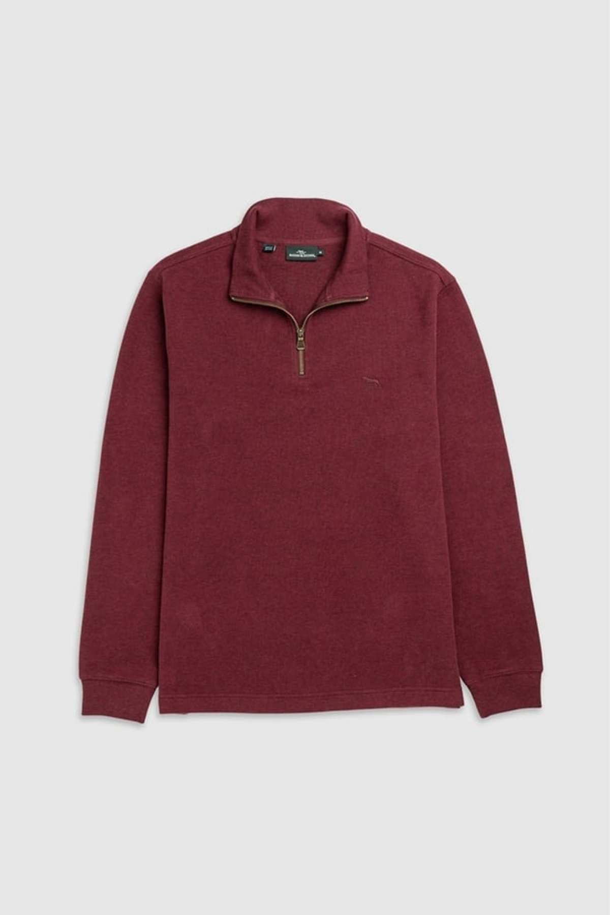 The Rodd & Gunn Alton Ave Sweat in maroon features long sleeves, a quarter-zip collar, subtle stitching, and ribbed cuffs, shown on a light gray background.
